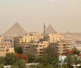 In the morning after we arrived to Giza, this was our view from the roof. You can't get the scale of how large they are but they are huge!